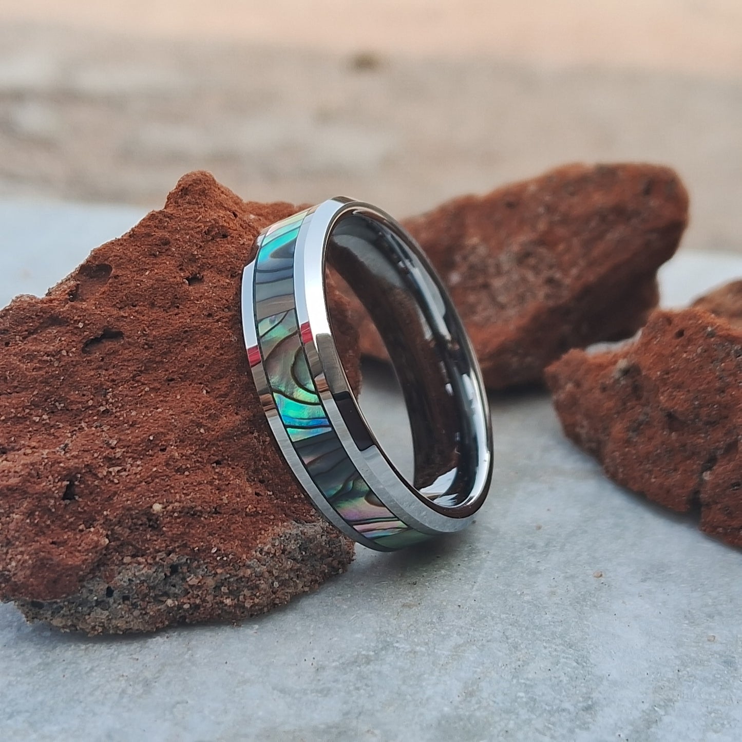 6mm Tungsten Ring features a stunning abalone shell inlay and a polished finish, offering a unique and stylish choice for men’s wedding band