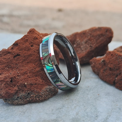 6mm Tungsten Ring features a stunning abalone shell inlay and a polished finish, offering a unique and stylish choice for men’s wedding band