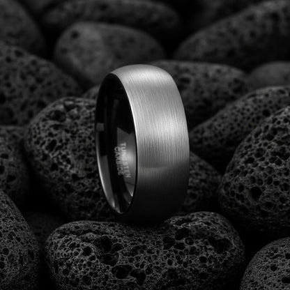 8mm brushed silver black tungsten carbide ring for men
Tungsten wedding band black interior comfort fit
Men's tungsten ring side view showing brushed finish
Custom engraved tungsten ring inner band
Man wearing black silver tungsten wedding band