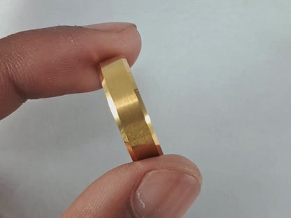 This 8mm 24K Gold Plated Tungsten Ring, featuring a sleek brushed finish, offers a stylish and durable choice for men’s wedding bands.